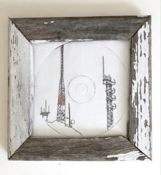 hand pressed drypoint etching on a CD with rustic frame